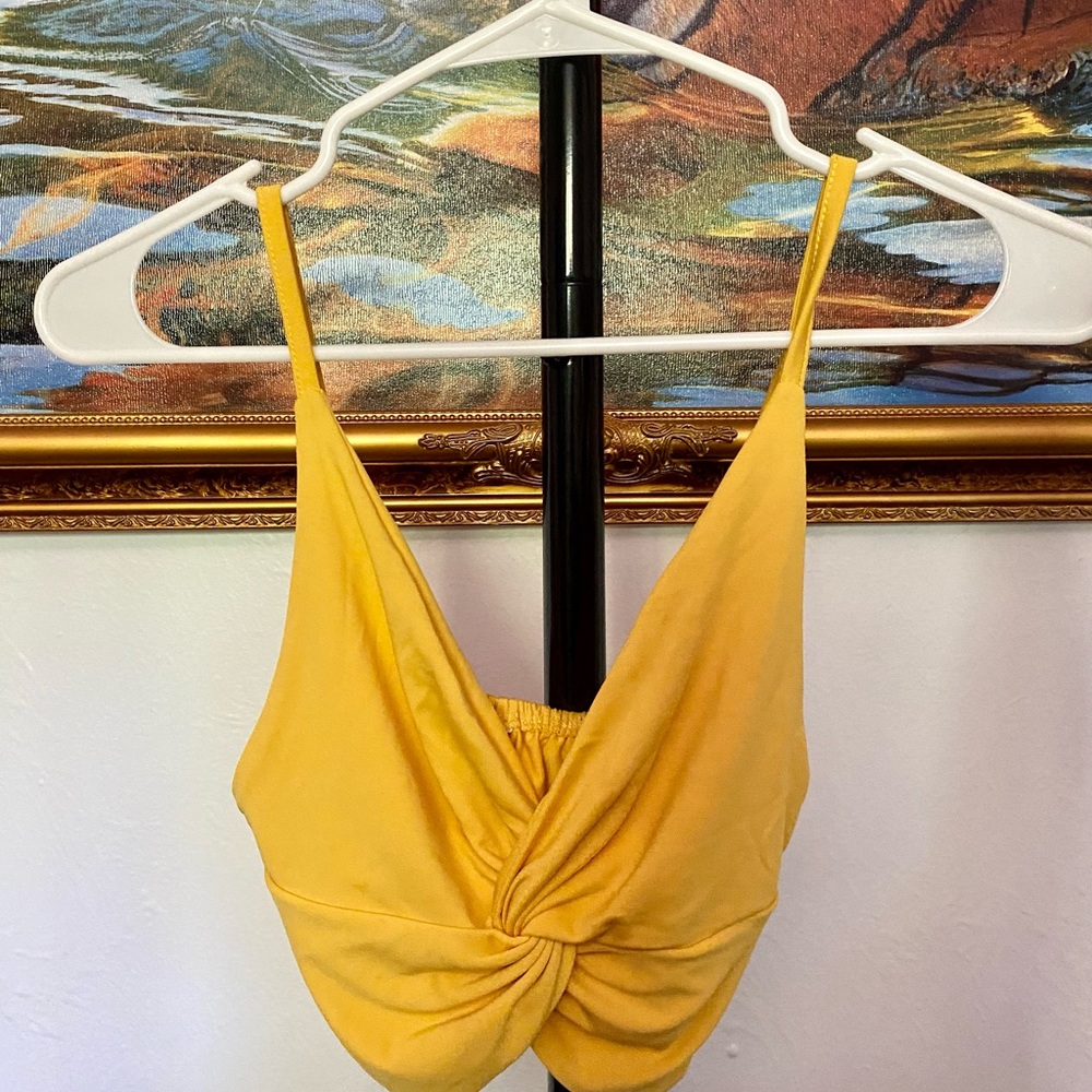 Yellow going out top